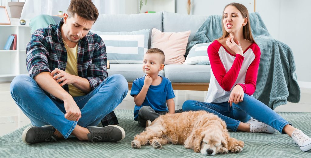 Family suffering from pet allergy at home Family suffering from pet allergy at home